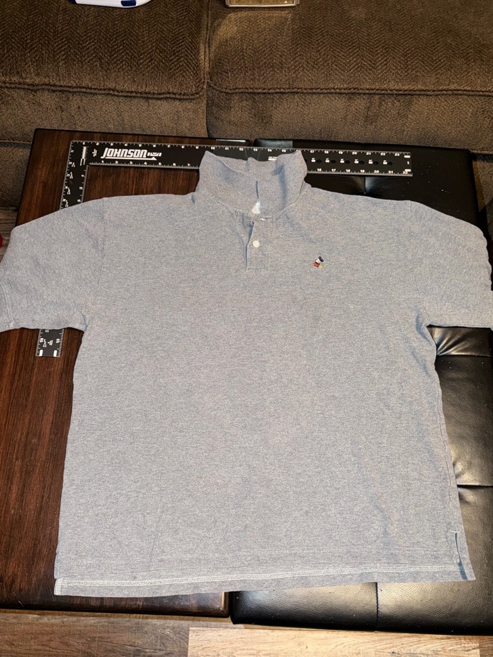 Vintage Disney Men's Heather Light Blue Polo with Small Embroidered Character